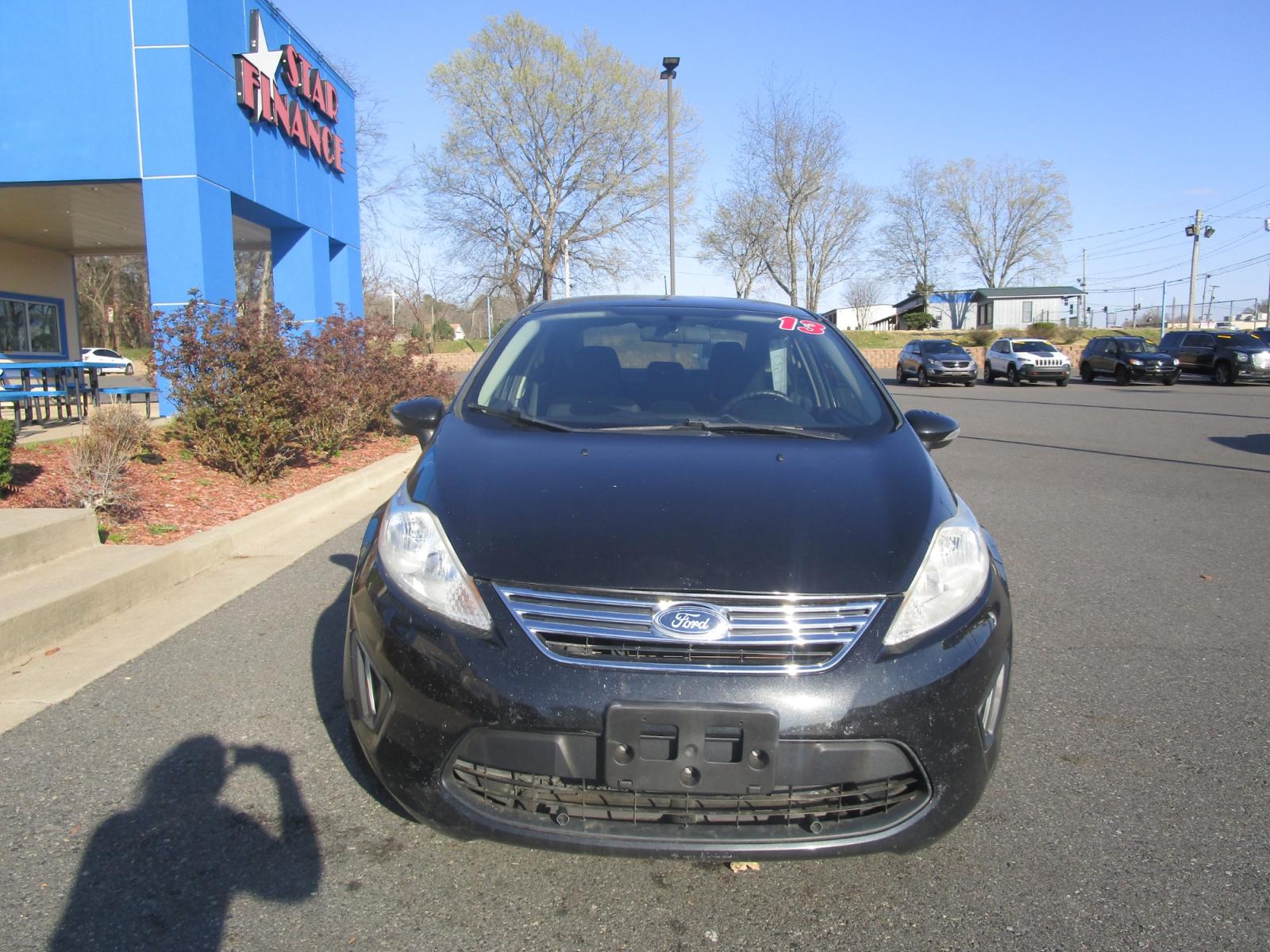 2013 BLACK /Black / Cloth Ford Fiesta SE Sedan (3FADP4BJ5DM) with an 1.6L L4 DOHC 16V engine, located at 1814 Albert Pike Road, Hot Springs, AR, 71913, (501) 623-1717, 34.494228, -93.094070 - Photo #1